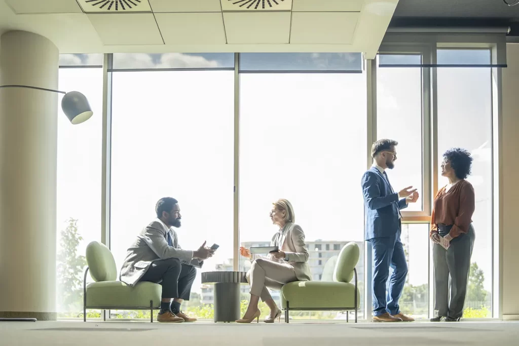 business colleagues chatting in lobby