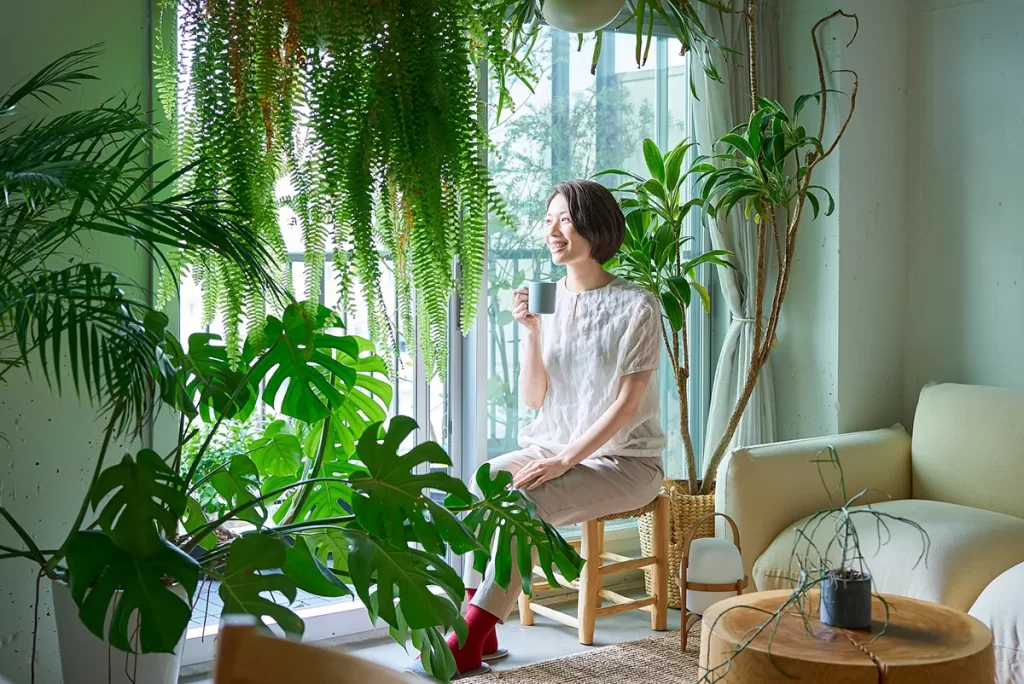 woman drinking coffee in living room