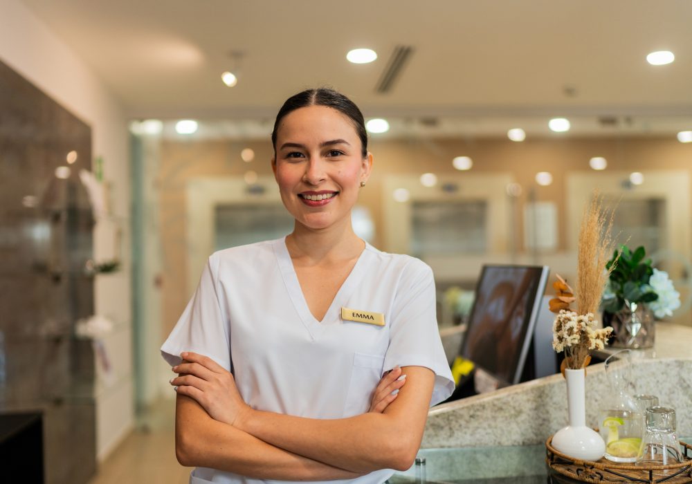 Portrait of a young masseuse in a spa